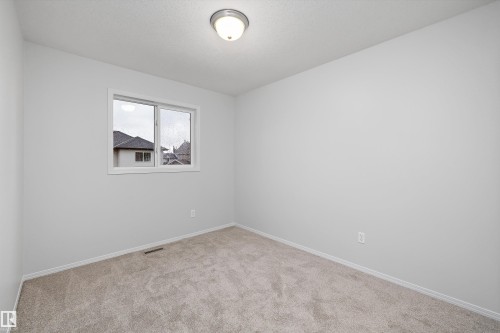 161 Rue Magnan, Beaumont, AB - Indoor Photo Showing Other Room