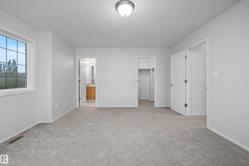 161 Rue Magnan, Beaumont, AB - Indoor Photo Showing Other Room