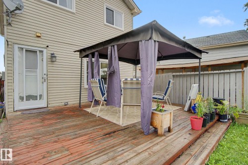 Multi-level wood decking featuring a gazebo area and privacy fencing - 18407 95A Avenue Nw, Edmonton, AB - Outdoor With Deck Patio Veranda With Exterior