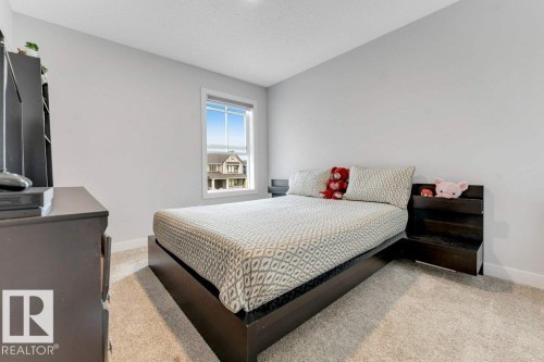 7017 54 Avenue, Beaumont, AB - Indoor Photo Showing Bedroom
