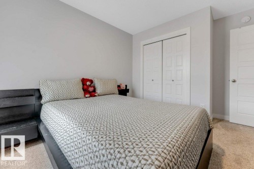 7017 54 Avenue, Beaumont, AB - Indoor Photo Showing Bedroom