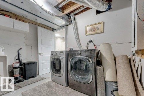 7017 54 Avenue, Beaumont, AB - Indoor Photo Showing Laundry Room