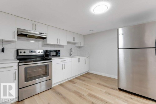 7017 54 Avenue, Beaumont, AB - Indoor Photo Showing Kitchen With Stainless Steel Kitchen