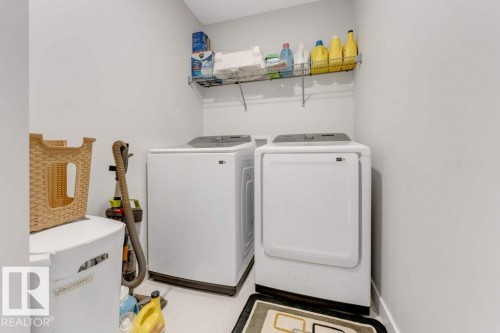7017 54 Avenue, Beaumont, AB - Indoor Photo Showing Laundry Room