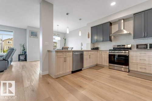 7017 54 Avenue, Beaumont, AB - Indoor Photo Showing Kitchen With Stainless Steel Kitchen With Upgraded Kitchen