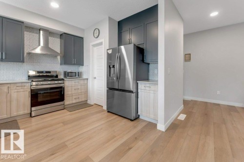 7017 54 Avenue, Beaumont, AB - Indoor Photo Showing Kitchen With Stainless Steel Kitchen