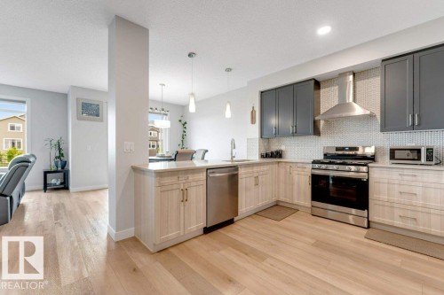 7017 54 Avenue, Beaumont, AB - Indoor Photo Showing Kitchen With Stainless Steel Kitchen With Upgraded Kitchen