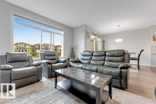 7017 54 Avenue, Beaumont, AB - Indoor Photo Showing Living Room