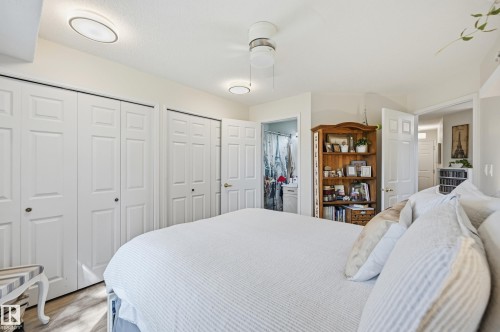 Recessed lighting and ceiling fan overhead - #208 9760 176 St Nw, Edmonton, AB - Indoor Photo Showing Bedroom