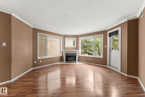 #203 8909 100 St Nw, Edmonton, AB - Indoor With Fireplace