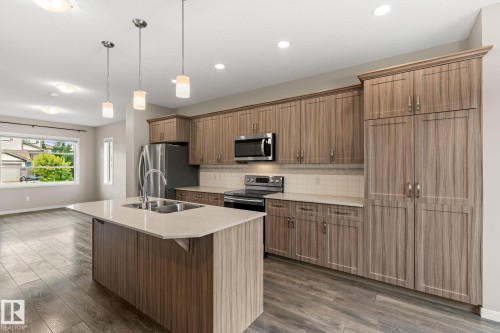 17159 49 Street Nw, Edmonton, AB - Indoor Photo Showing Kitchen With Double Sink With Upgraded Kitchen