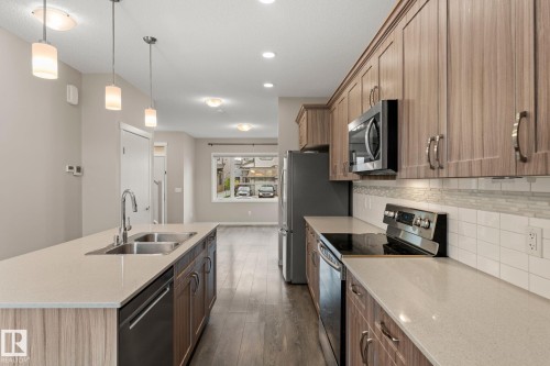 17159 49 Street Nw, Edmonton, AB - Indoor Photo Showing Kitchen With Double Sink With Upgraded Kitchen