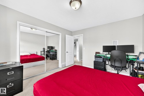 Bedroom featuring neutral-toned walls and carpeted flooring - #72 2505 42 St Nw, Edmonton, AB - Indoor