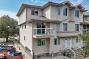 Multi-level exterior with light-toned siding, multiple windows, and a glass-paneled balcony - #72 2505 42 St Nw, Edmonton, AB  - Outdoor With Facade 
