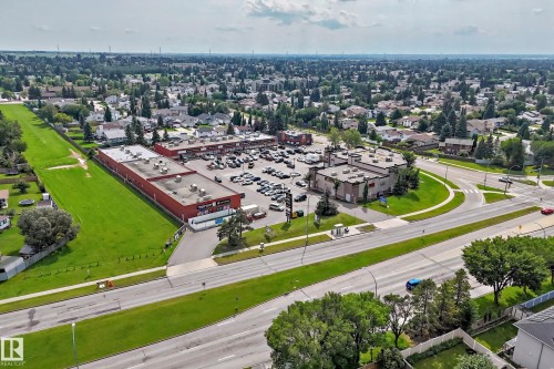 Commercial complex featuring multiple buildings with expansive parking areas - #72 2505 42 St Nw, Edmonton, AB - Outdoor With View