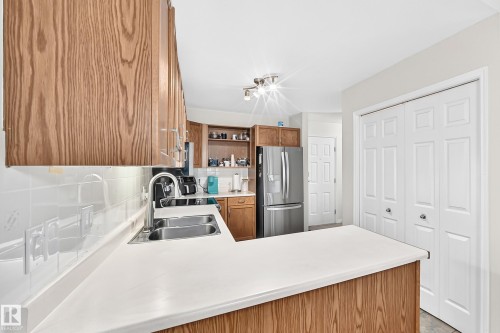 #20 9704 165 St Nw, Edmonton, AB - Indoor Photo Showing Kitchen With Double Sink