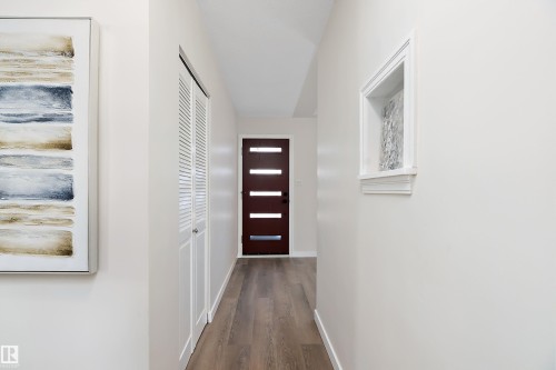 The front door was installed in 2026. - 9747 66 Avenue Nw, Edmonton, AB - Indoor Photo Showing Other Room