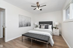 This bedroom has triple pane windows. - 