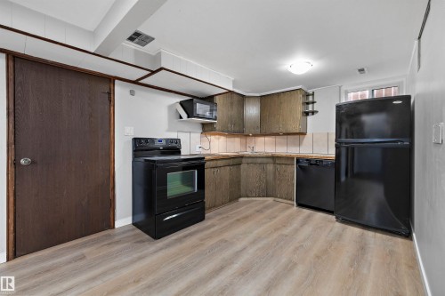 This will be useful for large gatherings when extra cooking space may be needed. - 9747 66 Avenue Nw, Edmonton, AB - Indoor Photo Showing Kitchen