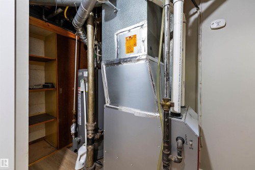 The high efficiency furnace was installed in 2024. - 9747 66 Avenue Nw, Edmonton, AB - Indoor Photo Showing Basement