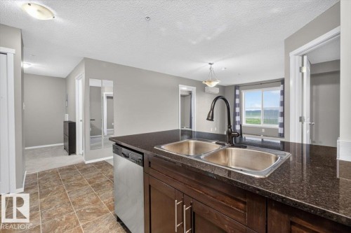 #204 18126 77 St Nw, Edmonton, AB - Indoor Photo Showing Kitchen With Double Sink