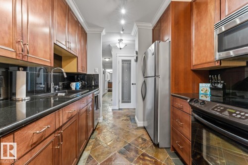 #307 911 10 St, Cold Lake, AB - Indoor Photo Showing Kitchen With Double Sink
