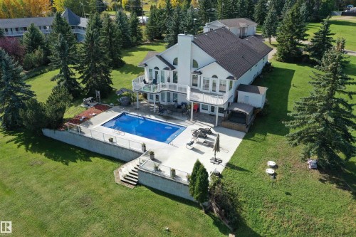 205 1 Avenue, Rural Wetaskiwin County, AB - Outdoor With In Ground Pool With Deck Patio Veranda