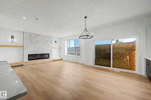 294 Munn Way, Leduc, AB - Indoor Photo Showing Living Room With Fireplace