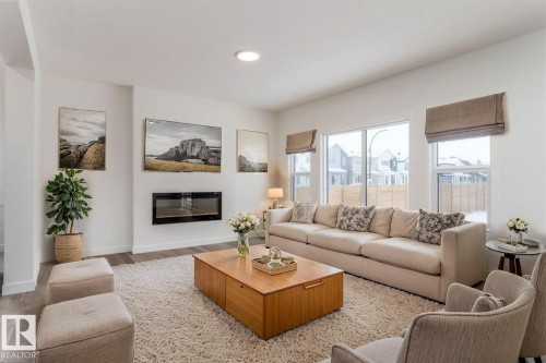 1 Empress Way, Spruce Grove, AB - Indoor Photo Showing Living Room With Fireplace