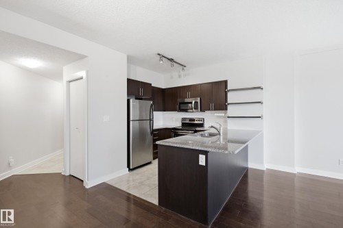 #1005 10152 104 St Nw, Edmonton, AB - Indoor Photo Showing Kitchen With Double Sink