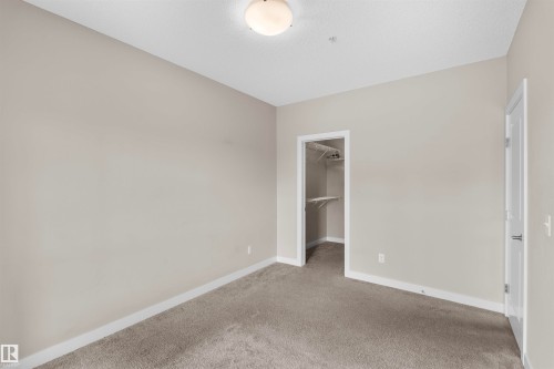 #115 12804 140 Av Nw, Edmonton, AB - Indoor Photo Showing Other Room
