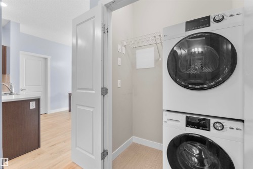 #115 12804 140 Av Nw, Edmonton, AB - Indoor Photo Showing Laundry Room