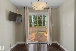 Sliding glass door opening to an outdoor deck - 