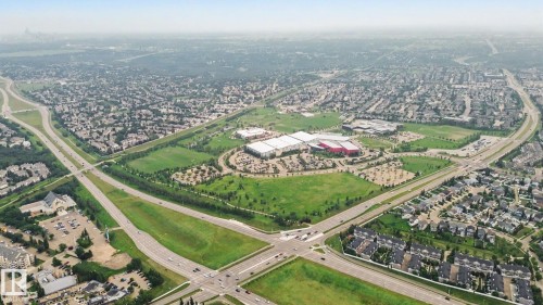 Aerial perspective showcasing extensive residential areas and commercial developments - 1047 Leger Boulevard Nw, Edmonton, AB -  With View