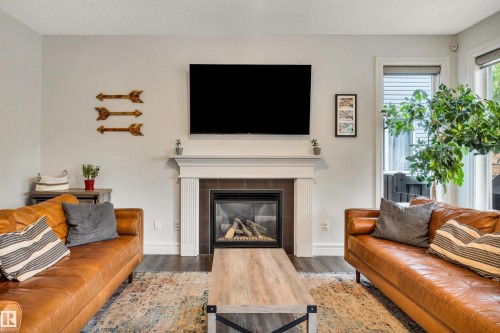 11935 21 Avenue Sw, Edmonton, AB - Indoor Photo Showing Living Room With Fireplace