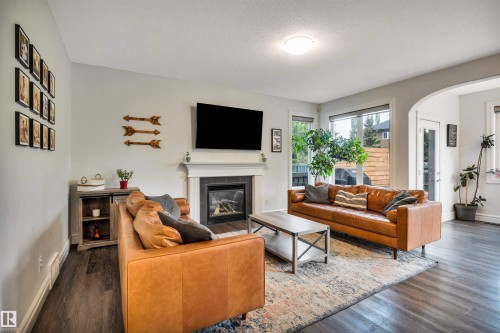 11935 21 Avenue Sw, Edmonton, AB - Indoor Photo Showing Living Room With Fireplace