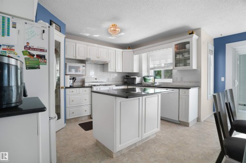 2715 44A Avenue Nw, Edmonton, AB - Indoor Photo Showing Kitchen With Double Sink