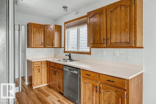 312 Lago Lindo Crescent Nw, Edmonton, AB - Indoor Photo Showing Kitchen With Double Sink