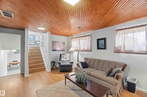 Wood-paneled ceiling with recessed lighting - 30 Cavanagh Crescent, Stony Plain, AB - Indoor Photo Showing Living Room