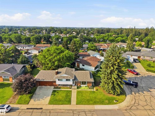 Single-story residence featuring a shingled roof and brick facade accents - 30 Cavanagh Crescent, Stony Plain, AB - Outdoor With View