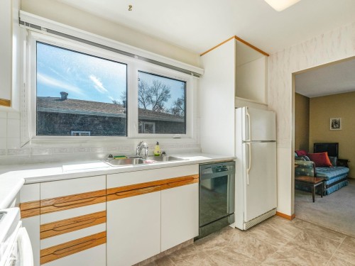 5916 148 Avenue Nw, Edmonton, AB - Indoor Photo Showing Kitchen With Double Sink