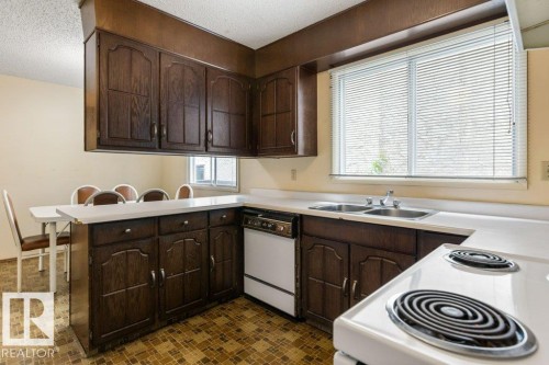 11113 173A Avenue Nw, Edmonton, AB - Indoor Photo Showing Kitchen With Double Sink