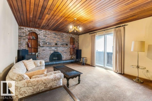 11113 173A Avenue Nw, Edmonton, AB - Indoor Photo Showing Living Room With Fireplace