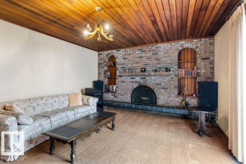 11113 173A Avenue Nw, Edmonton, AB - Indoor Photo Showing Living Room With Fireplace