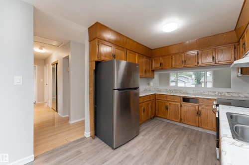 1131 35A Street Nw, Edmonton, AB - Indoor Photo Showing Kitchen With Double Sink
