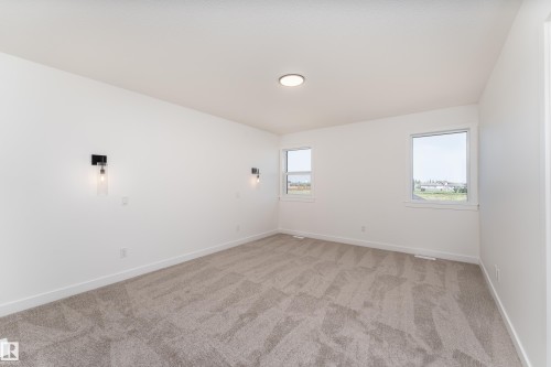 18 Tenuto Link, Spruce Grove, AB - Indoor Photo Showing Other Room