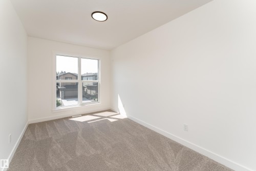 18 Tenuto Link, Spruce Grove, AB - Indoor Photo Showing Other Room
