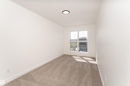 18 Tenuto Link, Spruce Grove, AB - Indoor Photo Showing Other Room