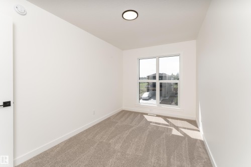 18 Tenuto Link, Spruce Grove, AB - Indoor Photo Showing Other Room