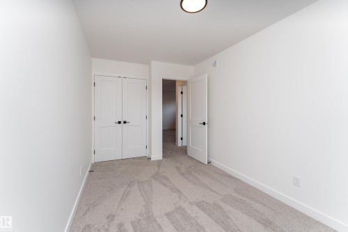 18 Tenuto Link, Spruce Grove, AB - Indoor Photo Showing Other Room